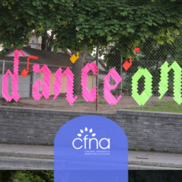 Dance On weaved into a fence with the CFNA logo